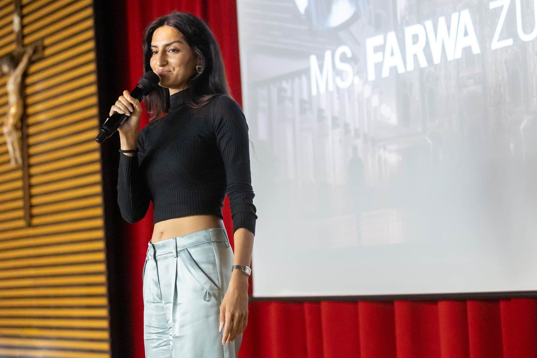A young entrepreneur presenting her work